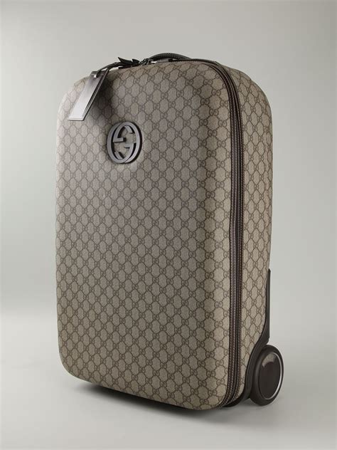 gucci luggage with wheels